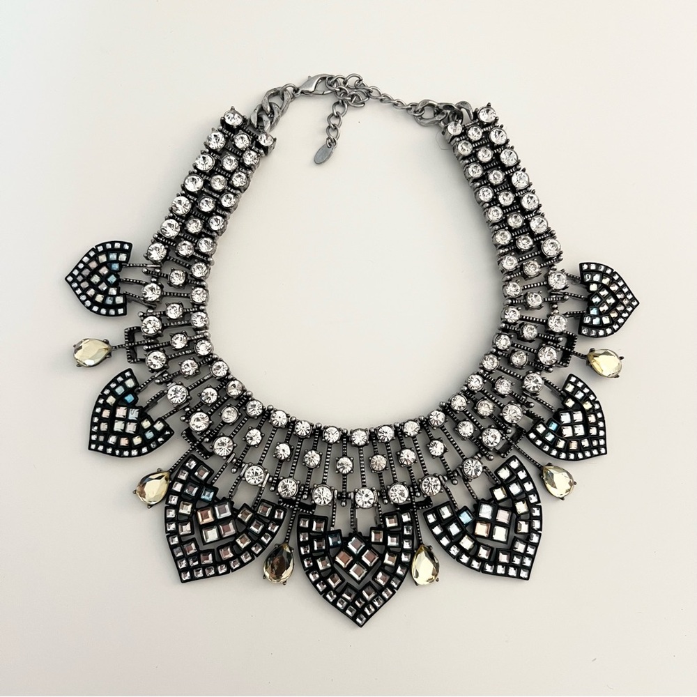 Stunning black and silver statement necklace with rhinestone gem details